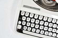 Load image into Gallery viewer, 1973 Hermes Baby Typewriter - French and English keyboard AZERTY