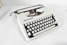 Load image into Gallery viewer, 1973 Hermes Baby Typewriter - French and English keyboard AZERTY