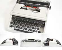 Load image into Gallery viewer, 1969 Olivetti Dora Typewriter