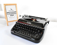 Load image into Gallery viewer, 1953 German Erika 10 Glossy Black Typewriter