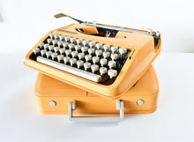Load image into Gallery viewer, Olivetti Lettera 82 Orange Portable Typewriter
