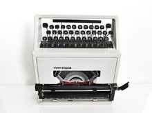 Load image into Gallery viewer, Olivetti Dora, UNCOMMON Techno cubic typeface