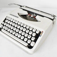 Load image into Gallery viewer, 1973 Hermes Baby Typewriter - French and English keyboard AZERTY
