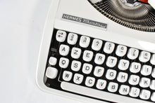 Load image into Gallery viewer, 1973 Hermes Baby Typewriter - French and English keyboard AZERTY
