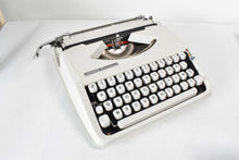 Load image into Gallery viewer, 1973 Hermes Baby Typewriter - French and English keyboard AZERTY
