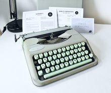 Load image into Gallery viewer, 1957 Portable Seafoam Hermes Baby Typewriter
