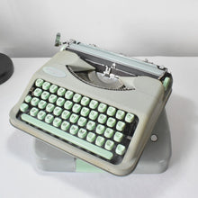 Load image into Gallery viewer, 1957 Portable Seafoam Hermes Baby Typewriter

