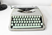 Load image into Gallery viewer, 1957 Portable Seafoam Hermes Baby Typewriter
