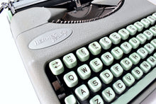 Load image into Gallery viewer, 1957 Portable Seafoam Hermes Baby Typewriter
