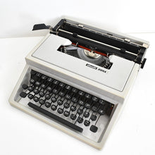 Load image into Gallery viewer, Olivetti Dora, UNCOMMON Techno cubic typeface
